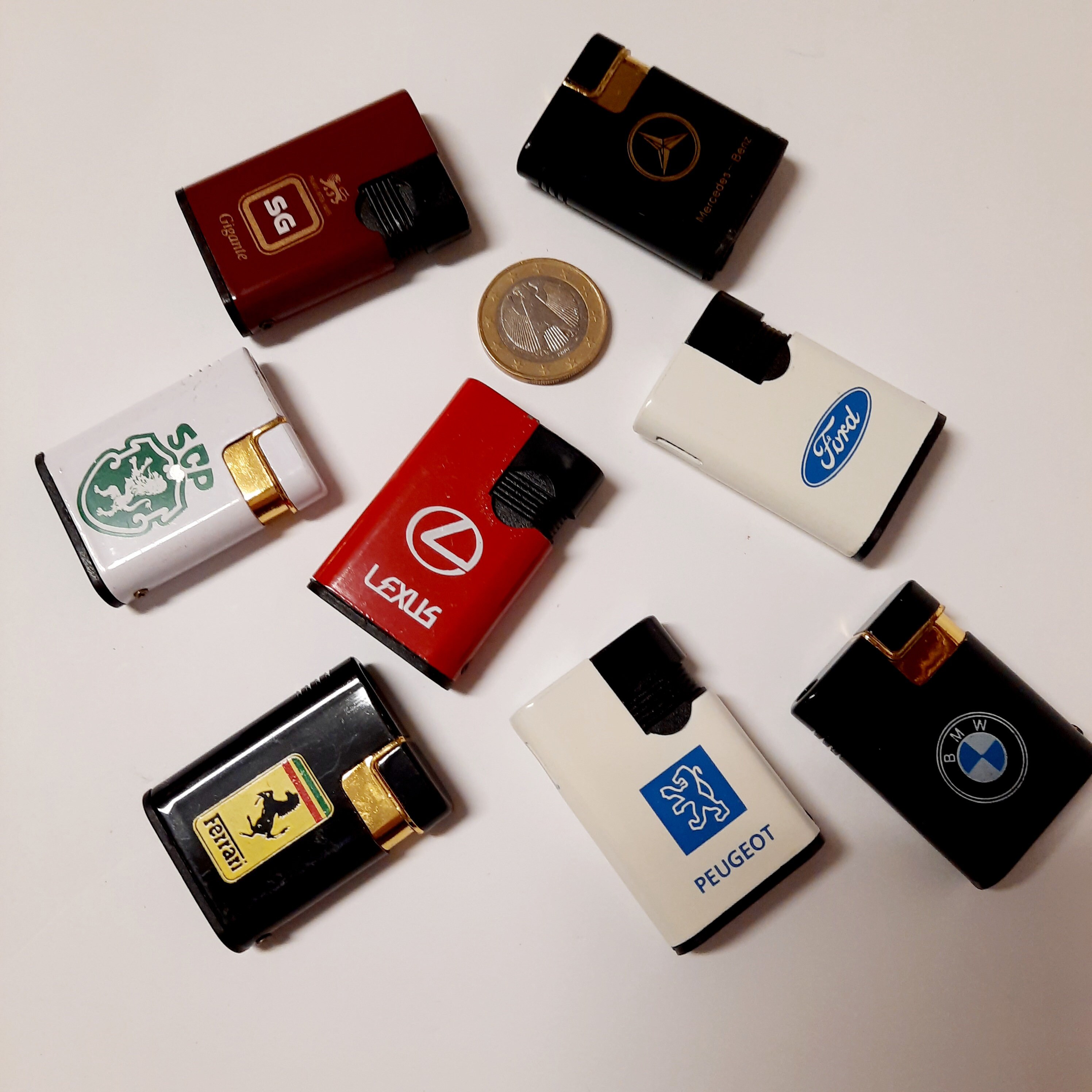 Vintage Lighters. Metal Lighters With Logos of Automobile Brands. Gas