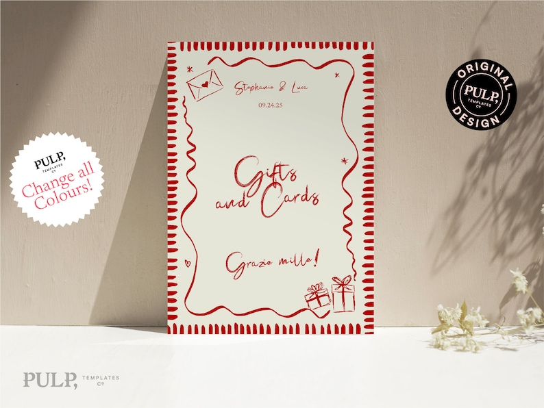 May include: A white card with a red border and red text that says "Gifts and Cards" with the text "Grazie mille!" below. The card has a red envelope with a heart in the top left corner and two red gift boxes in the bottom right corner.