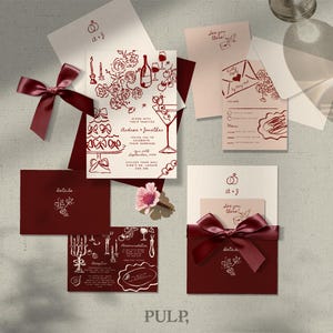 May include: Wedding invitation suite with burgundy accents. Includes invitation cards, RSVP cards, and envelopes. The design features floral and cocktail illustrations, with a burgundy ribbon and the text "PULP,"