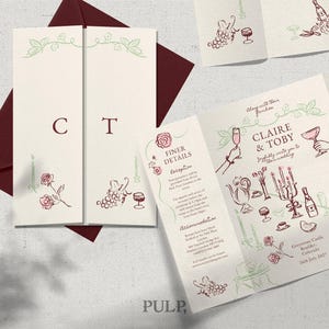 Puede incluir: Juego de invitaciones de boda con un sobre burdeos y tarjetas color crema. Las tarjetas presentan ilustraciones de flores, uvas y copas de champán en burdeos y verde. La invitación dice "Claire & Toby" e incluye detalles de la boda.