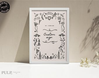 May include: A framed print with a white border featuring a hand-drawn design. The design includes iconic city elements like the Statue of Liberty, a taxi, and the text "Custom sign". The print is A4 size, 21x29.7cm.