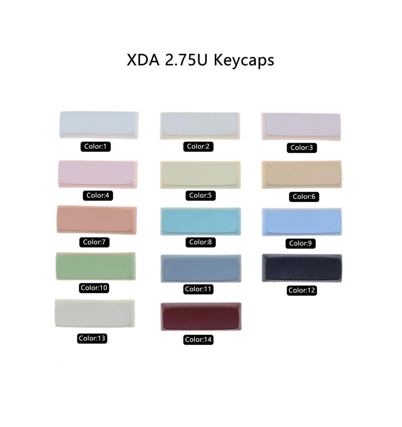 Puede incluir: Un conjunto de 14 teclas XDA 2.75U en varios colores, incluyendo blanco, rosa claro, beige, melocot&oacute;n, azul claro, verde, gris, negro y burdeos.