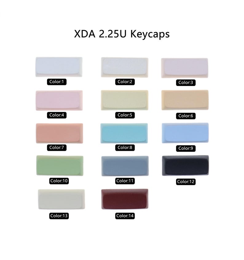 Puede incluir: Un conjunto de 14 teclas XDA 2.25U en varios colores, incluyendo blanco, rosa, beige, azul claro, verde, gris, negro y rojo.
