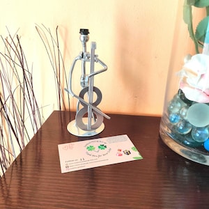 Welded Metal Cello Player Sculpture: Upcycled Musician Art Decor