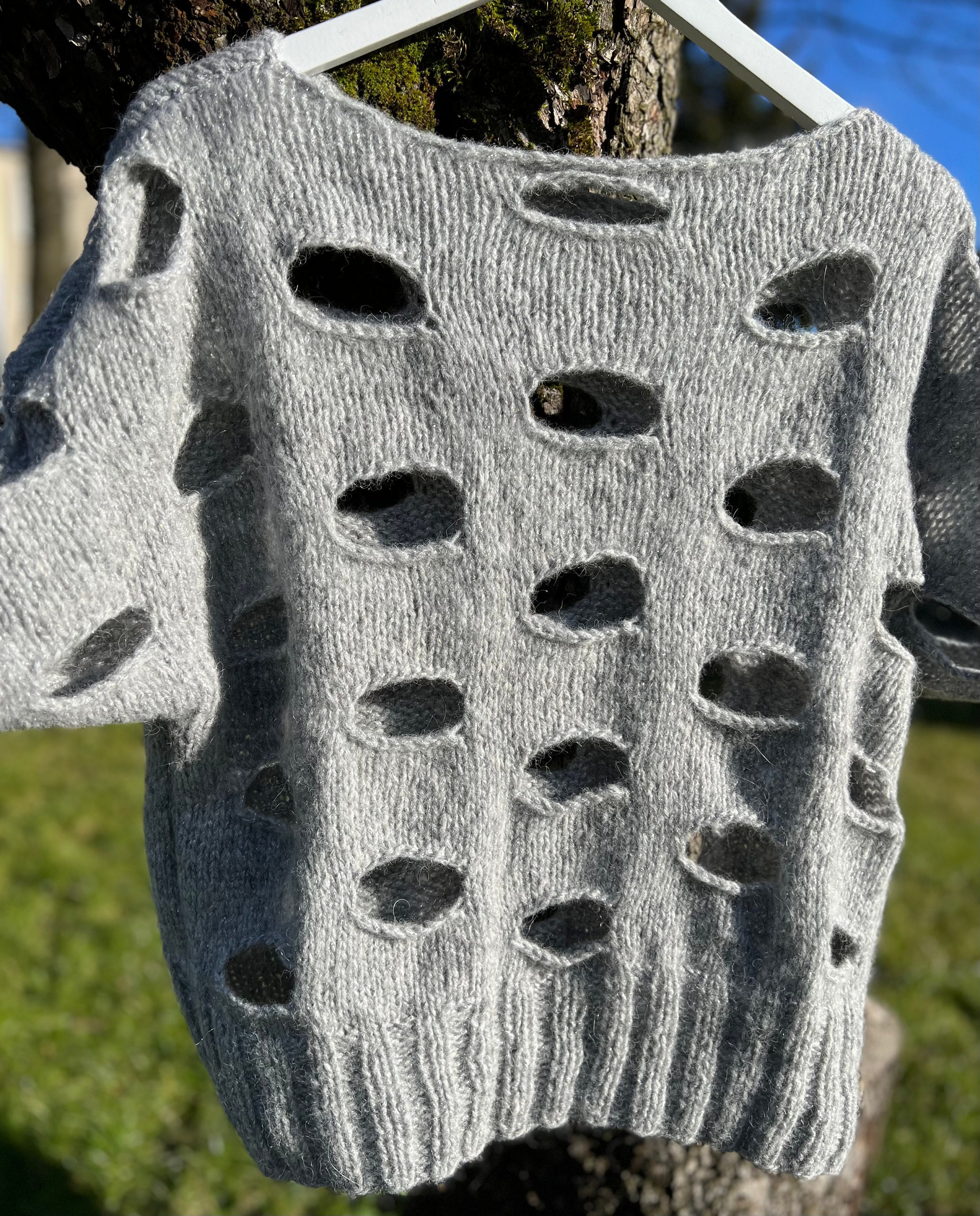 Holey sweater cheap