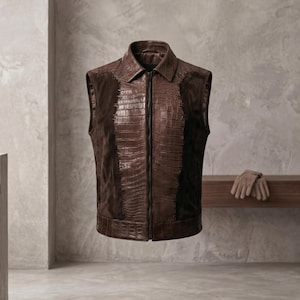 Front view of a luxury handmade leather mens waistcoat featuring glossy crocodile embossed center panels and soft brown suede Vest men sides, accented with heavy leather lacing.