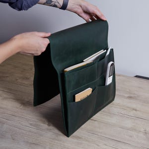 Green leather sofa armrest organizer with personalization | Custom leather sofa armrest holder with pocket for books, remote control