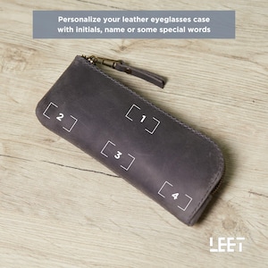 a leather wallet with numbers on it