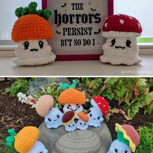 May include: Crocheted mushroom plushies with white bodies and colorful caps. One has an orange cap with green leaves, another a red cap with white spots. A framed sign reads "THE horrors PERSIST - BUT SO DO I."