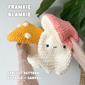 May include: Two crocheted mushroom-shaped blankets. One is yellow with white spots, the other is off-white with a pink cap. The blankets have embroidered faces. Text on the image reads "FRANKIE BLANKIE" and "CROCHET PATTERN BY CABLE + CANVAS."