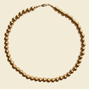 golden_hematite_gemstone_round_beaded_necklace