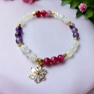 Handmade gemstone bracelet with zircon pendant