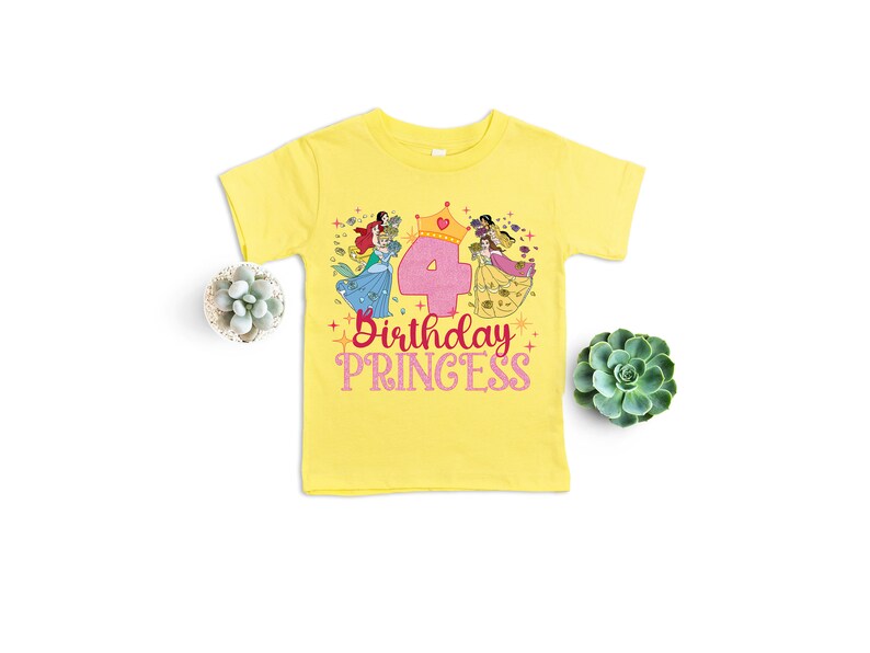 May include: Yellow t-shirt with a pink number four and a graphic of Disney princesses. The text "Birthday Princess" is printed on the shirt.