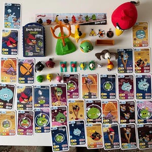 Angry Birds Rovio 2009-2016 Lote aleatorio mixto de figuras, juguetes, tarjetas, imanes, peluches y mucho más.