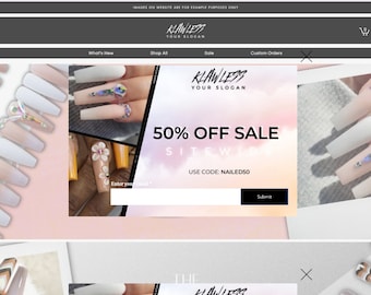 May include: A website banner advertises a 50% off sale on press-on nails. The ad features a pink and white background with the text "KLAWLESS YOUR SLOGAN 50% OFF SALE SITEWIDE USE CODE: NAILEDSO". The ad also includes images of different styles of press-on nails.