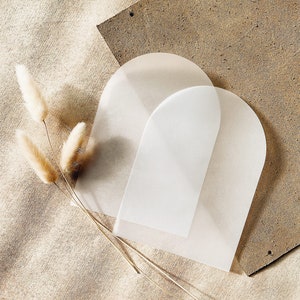 May include: A set of three ceramic mugs with a speckled, matte finish in cream, light brown, and dark brown. Each mug has a simple, minimalist design, ideal for tea or coffee.