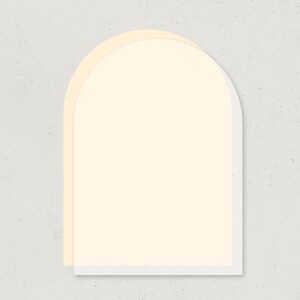 May include: A layered, minimalist design featuring a soft, off-white arch shape. The arch is outlined in a subtle white border, with a pale yellow overlay creating a sense of depth. The background is a textured, speckled light grey.