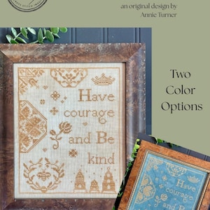 May include: Cross-stitch design with the words "Have Courage and Be Kind" in a decorative font. The design is in a wooden frame, with a second framed option in blue. The Proper Stitcher logo is in the upper left.