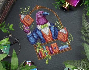 May include: Cross-stitch design featuring a purple bird in a suit, holding books and framed by a decorative arch. The bird has a green bow tie and is surrounded by whimsical details. The design includes the text "Fine Frog Stitching".