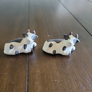 2 miniature Vintage Cows Figurines