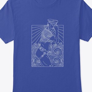 May include: Royal blue t-shirt featuring a white line art illustration. The design depicts a person in a sailor hat and harness, with a stylized background of sun rays and swirling lines. The shirt is a classic crew neck.