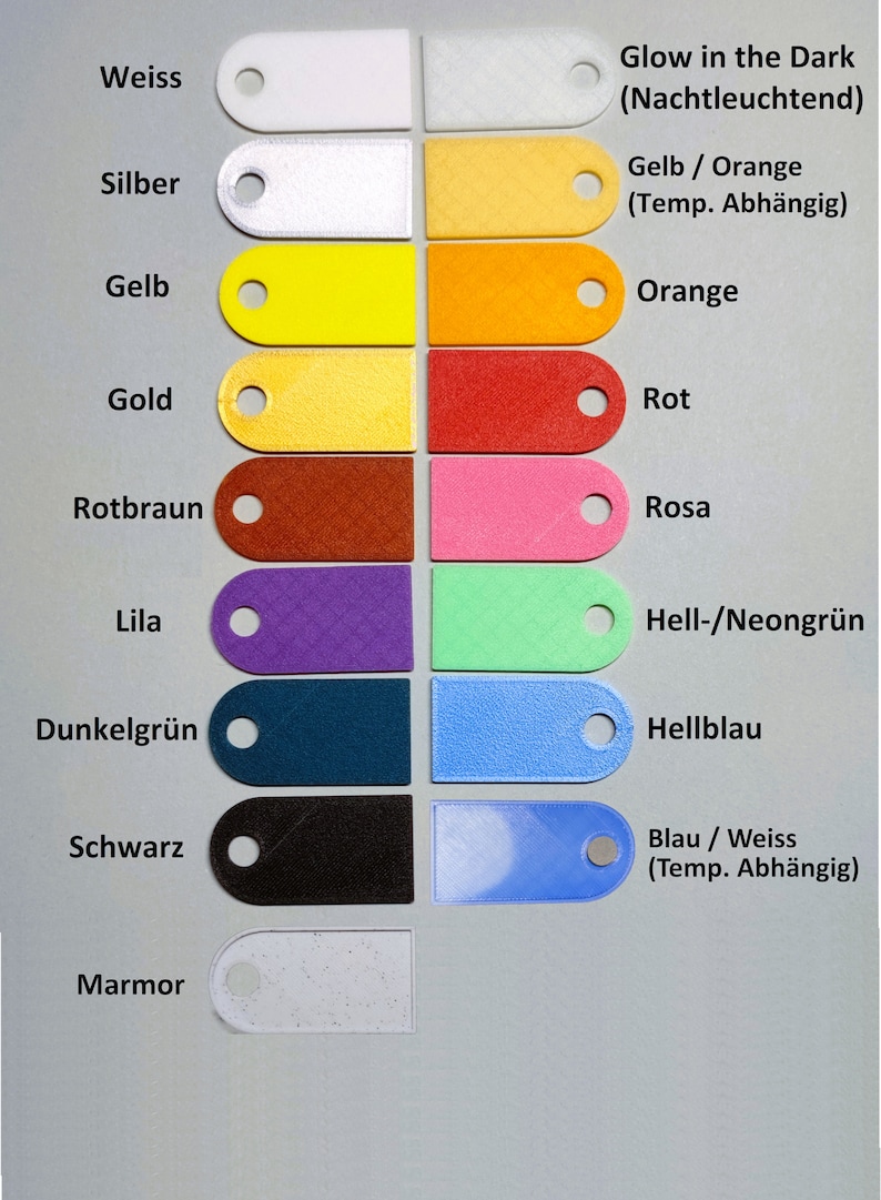 Puede incluir: Una tabla que muestra 12 muestras de color diferentes con nombres y descripciones de colores en alem&aacute;n. Los colores incluyen blanco, plata, amarillo, oro, marr&oacute;n rojizo, lila, verde oscuro, negro y m&aacute;rmol. La tabla tambi&eacute;n incluye colores que brillan en la oscuridad como naranja, rojo, rosa, verde, azul claro y azul/blanco.