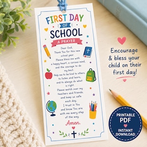 May include: A rectangular white bookmark with a blue border and a blue string at the top. It features the text First Day of School A Prayer, along with colorful illustrations of a pencil, apple, Bible, backpack, globe, and a cup of colored pencils.