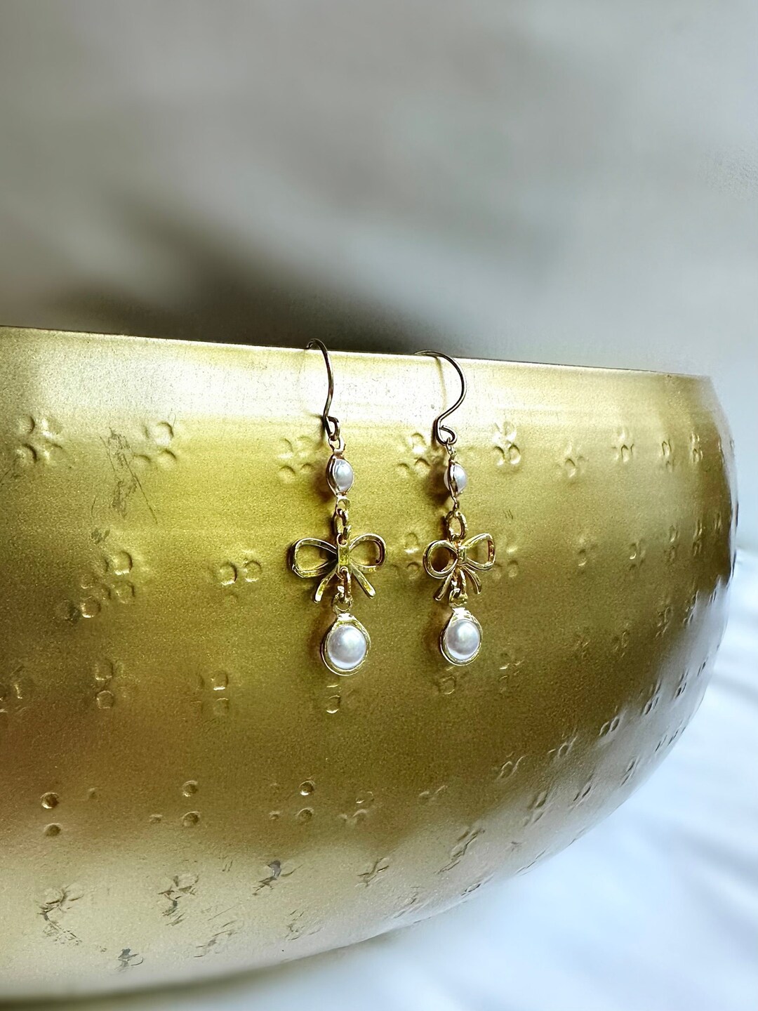 Pearly Bow Charm Dangle Earrings main image 1