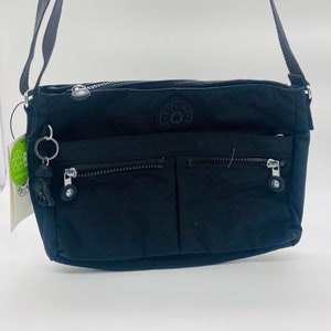 Kipling angie 2025 solid crossbody bag