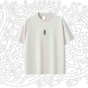 May include: A white t-shirt with a black symbol on the front. The symbol is a stylized design of four connected triangles.