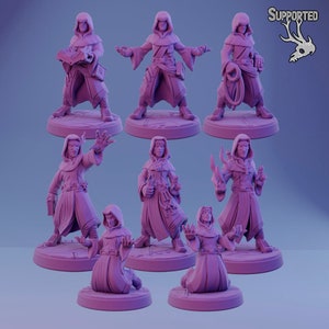 May include: Seven 3D printed miniature figures of robed figures with hoods. The figures are in various poses, some with hands raised, some with hands clasped, and some with hands holding objects. The figures are printed in a light purple colour and are set on circular bases.