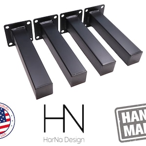 May include: Four black metal table legs with a square top and rectangular body. Each leg has four pre-drilled holes for mounting. The image includes the text "HarNa Design", a "Made in USA" seal, and a "Hand Made" stamp.