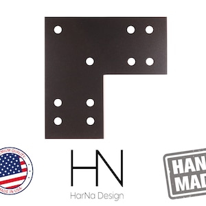May include: Black metal corner brace with eight evenly spaced holes. The brace is made in the USA and is hand-made. The text "HN HarNa Design" is below the brace.