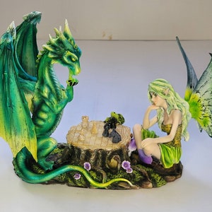 Whimsical Green Forest Fairy and Green Forest Dragon Playing Chess in the Woods Statue Figurine