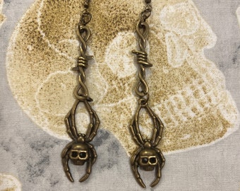 Bronze barbed wire and spider earrings