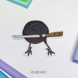 Crow Holding Knife Die-Cut Vinyl Bird Sticker | Cute Funny Spooky Witchy Animal Meme Sticker for Water Bottles, Laptops, Journals