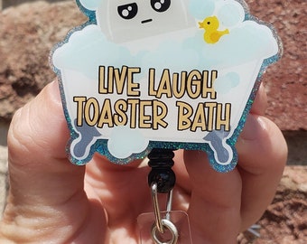 Live laugh toaster bath badge reel