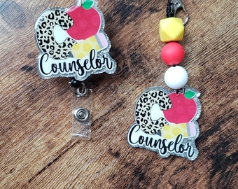 Counselor badge reel or counselor keychain