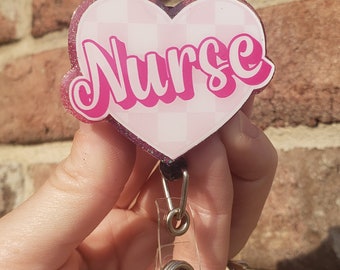 Pink nurse heart badge reel