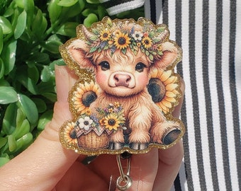 cow sunflower badge reel