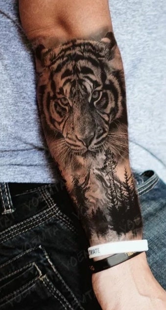 In progress sleeve, currently two pieces on my forearm - Tiger was from  @hiro_cwtattoo and Oni from @dan._.tat : r/irezumi