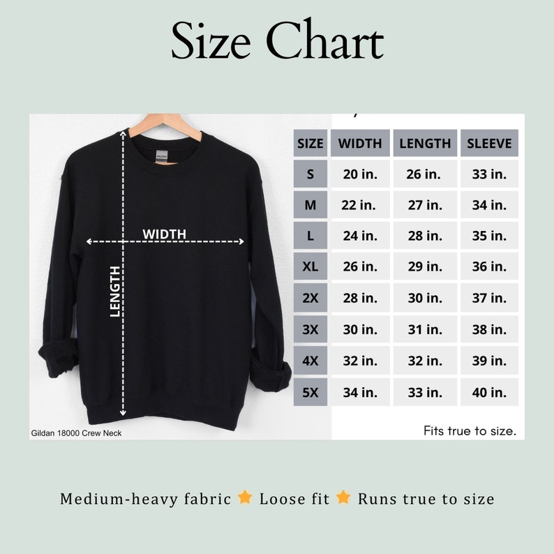 May include: A black crew neck sweatshirt on a wooden hanger with a size chart displaying width, length, and sleeve measurements in inches for sizes S through 5X. The chart includes the text Gildan 18000 Crew Neck, Medium-heavy fabric, Loose fit, and Runs true to size.