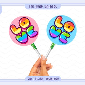 May include: Two lollipop holders with the word "LOVE" in rainbow colors. One is on a pink background, the other on a blue background. The holders are held by a hand. The image also includes the text "LOLLIPOP HOLDERS" and "PNG / DIGITAL DOWNLOAD".