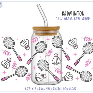 May include: A clear 16oz glass can wrap with a bamboo lid and a glass straw. The wrap features a badminton theme with rackets, shuttlecocks, pink accents, and the text "Badminton 16oz Glass Can Wrap".