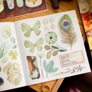 May include: A collection of green illustrations, including butterflies, a peacock feather, a leafy branch, and a mushroom. The illustrations are on a white page with the text "fig.05 Green Collection".