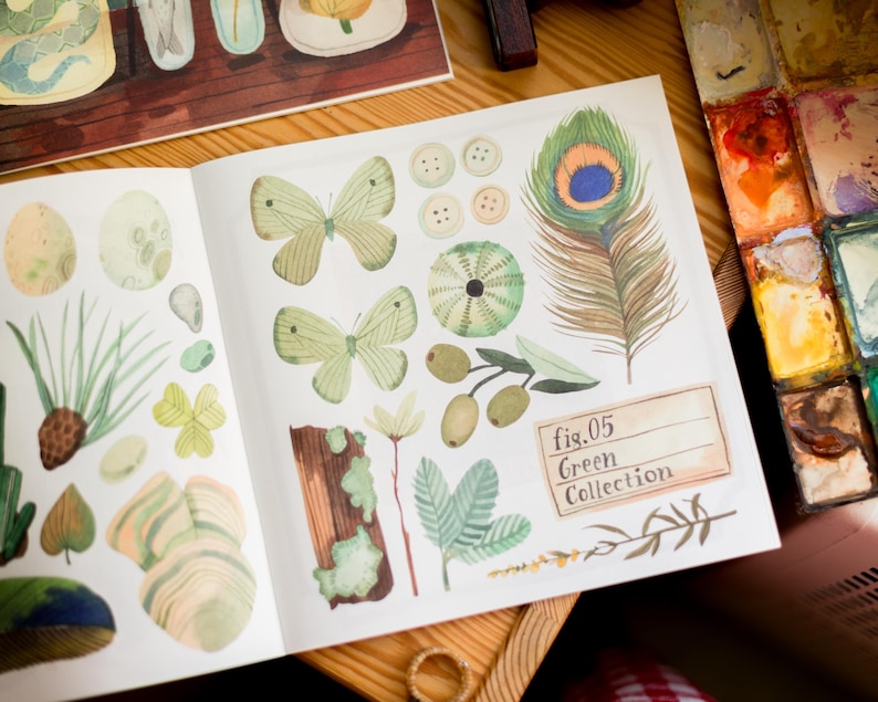 May include: A collection of green illustrations, including butterflies, a peacock feather, a leafy branch, and a mushroom. The illustrations are on a white page with the text "fig.05 Green Collection".