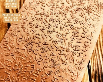 Alphabet Embossed Rubber Texture Mat: Polymer Clay Jewelry Tool (10x14cm)