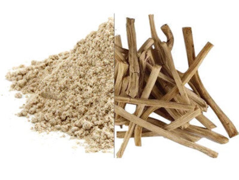 May include: A pile of light brown, dried, and powdered roots. The roots are long and thin, and the powder is fine and light.