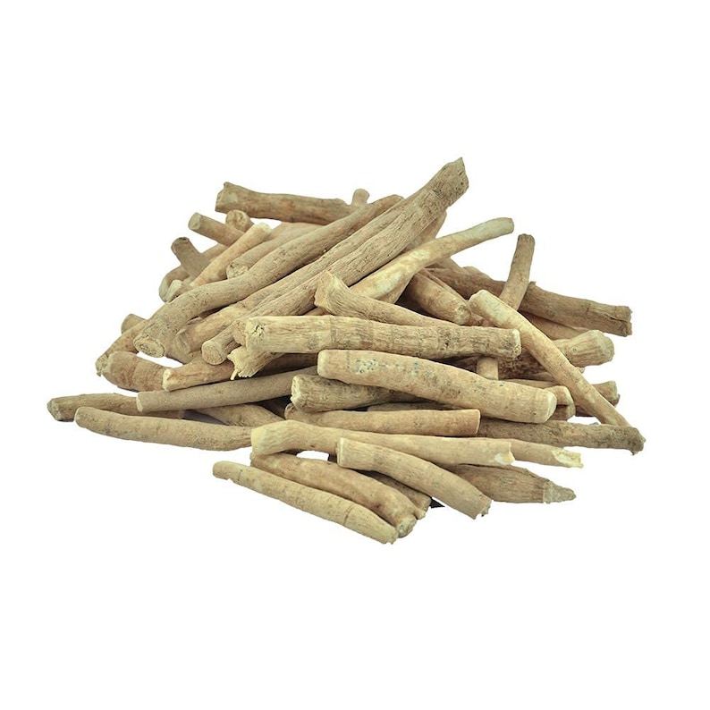 May include: A pile of dried, light brown, root-like herbs. The herbs are long and thin, with a slightly rough texture.