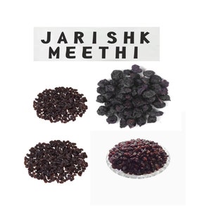 May include: Three piles of dried black raisins. The text "JARISHK MEETHI" is visible in the top of the image.